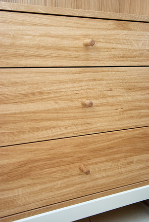 Wooden cabinet with glass doors and wooden drawers made of solid oak