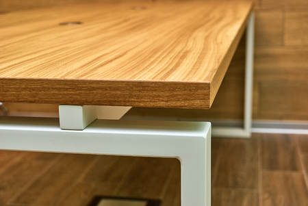 Wooden table in solid oak. Metal legsの写真素材