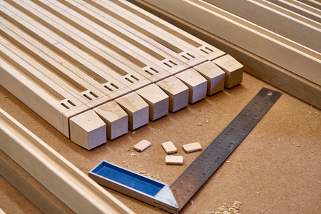 Woodworking and carpentry production. Wooden elements of a children's bed. Furniture manufacture....