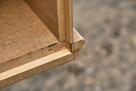 Mdf cabinet carcass. Home library with classic design. Work in progress. Wooden furniture manufacturing processの写真素材