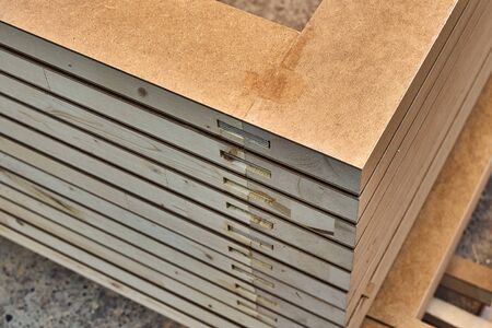 Joinery. Wood door manufacturing process. Stacked door leafs. Woodworking and carpentry production....