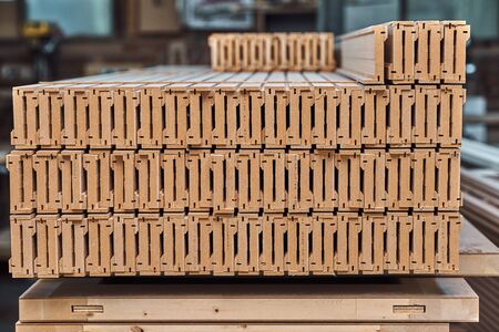 Joinery. Wood door manufacturing process. Stacked door architraves. Woodworking and carpentry...