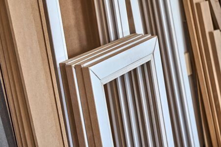 MDF cabinet door. Joinery. Disassembled glass cabinet doors in workshop. Furniture manufacture. Close-upの写真素材