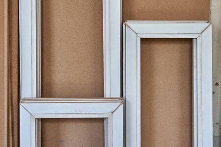 MDF cabinet door. Joinery. Disassembled glass cabinet doors in workshop. Furniture manufacture....