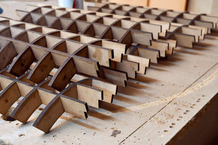 Joinery. MDF frames for bending plywood in workshop. Bend furniture manufacture
