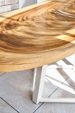 Wonderful designer dining table made of large lacquered live edge suar wood slab on metal carcass...