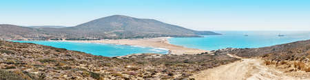 Prasonisi beach with Aegean and Mediterranean seas on Rhodes. Isthmus sand beach divides turquoise...