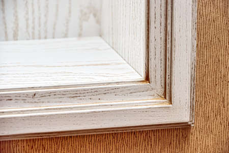 Fragment of built-in bookcase made of veneer and solid ash in light enamel with gray patina....