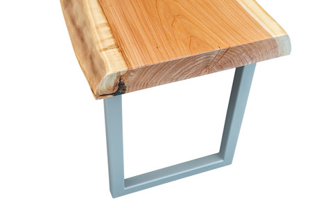 Bench with live edge wood top and gray metal legs in simple modern design isolated on a white background. Close-up viewの写真素材