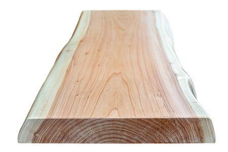 Live edge wooden board with beautiful grain and knots isolated on white background. Perspective viewの写真素材