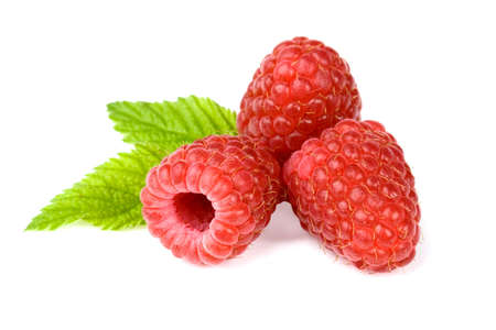 Several ripe berries of the raspberry with sheet on white background