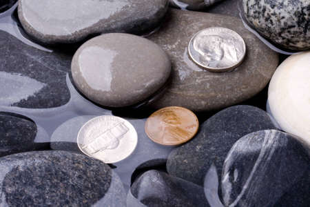 Sea water, stones and coins