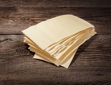 raw lasagna sheets on the boards.の写真素材