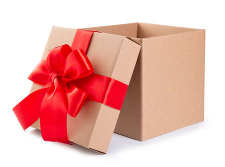 open gift cardboard box and red bow isolated on whiteの写真素材
