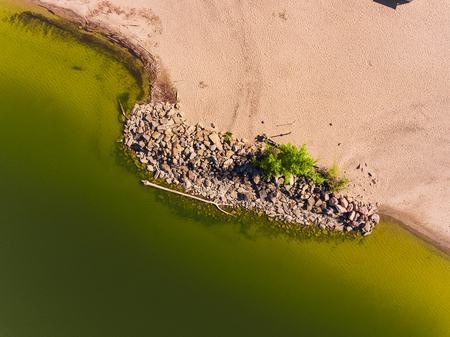Aerial view of ocean beach. Sand beach and sea view from above. Beach aerial view of ocean water and sand shore.の写真素材