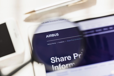 Toulouse, France - 27 February 2019: Airbus SE official website homepage under magnifying glass. Concept Airbus SE logo visible on smartphone, tablet screen,のeditorial素材