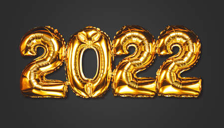 Happy New year 2022 celebration. Bright gold balloons figures New Year Balloons with glitter stars...