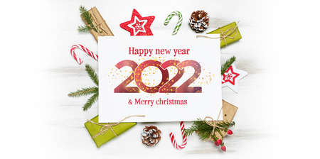 2022 Happy New Year. Christmas composition gift boxes with pine tree and decoration for mock up...