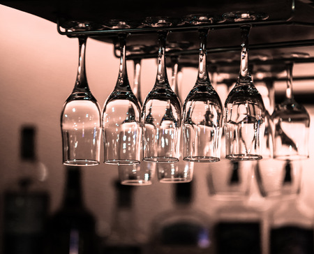 the glasses in the bar over the barの写真素材
