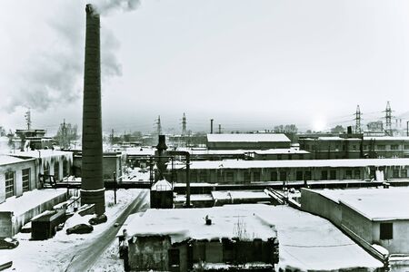 Sunset at factory. Aged photo.の写真素材