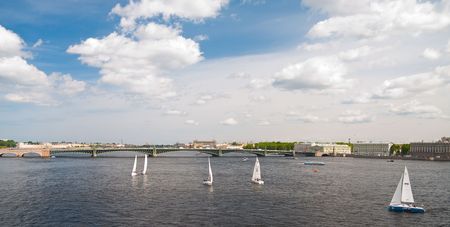 Sailing Regatta in St. Petersburg, Russia. Yachts sailing on the river under the blue skyのeditorial素材