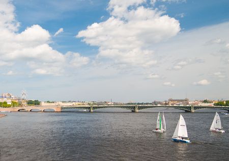 Sailing Regatta in St. Petersburg, Russia. Yachts sailing on the river under the blue skyのeditorial素材