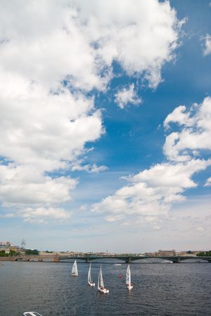 Sailing Regatta in St. Petersburg, Russia. Yachts sailing on the river under the blue skyのeditorial素材