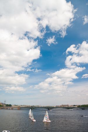 Sailing Regatta in St. Petersburg, Russia. Yachts sailing on the river under the blue skyのeditorial素材