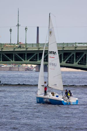 Sailing Regatta in St. Petersburg, Russia. Yachts sailing on the river under the blue skyのeditorial素材