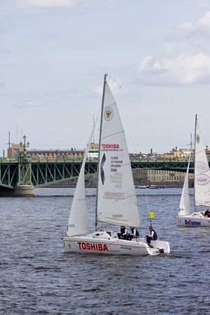 Sailing Regatta in St. Petersburg, Russia. Yachts sailing on the river under the blue skyのeditorial素材