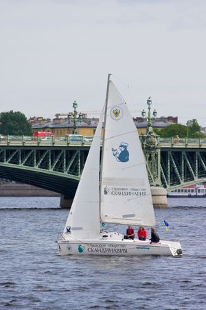 Sailing Regatta in St. Petersburg, Russia. Yachts sailing on the river under the blue skyのeditorial素材