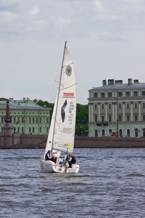 Sailing Regatta in St. Petersburg, Russia. Yachts sailing on the river under the blue skyのeditorial素材