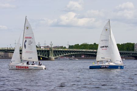 Sailing Regatta in St. Petersburg, Russia. Yachts sailing on the river under the blue skyのeditorial素材