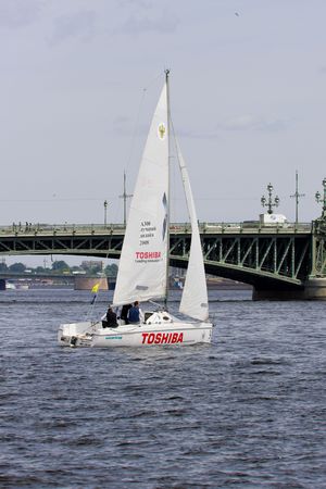 Sailing Regatta in St. Petersburg, Russia. Yachts sailing on the river under the blue skyのeditorial素材