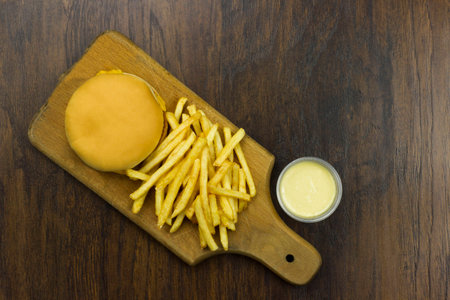 cheeseburger fries sauce junk food fast food cheese meat bad food not healthyの写真素材