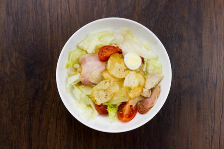 Caesar salad delicious healthy food tomatoes croutons Parmesan cheese and fresh mozzarellaの写真素材