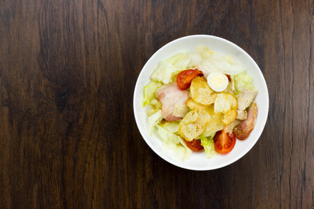 Caesar salad delicious healthy food tomatoes croutons Parmesan cheese and fresh mozzarellaの写真素材
