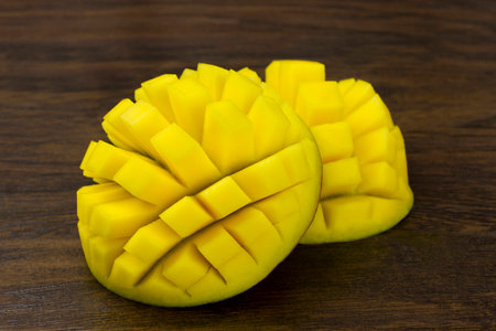 two mango sliced cube ripe fresh red green yellow vitamins tropical lifeの写真素材