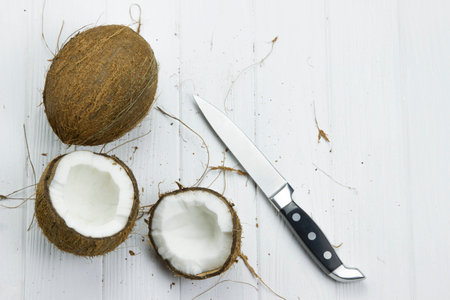 coconut pulp fresh tropical brown white organic coconut milk knifeの写真素材