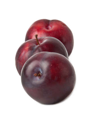Red plum fruit isolated on white backgroundの写真素材