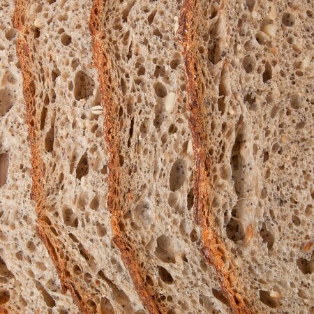 slices of rye bread   on the wooden table