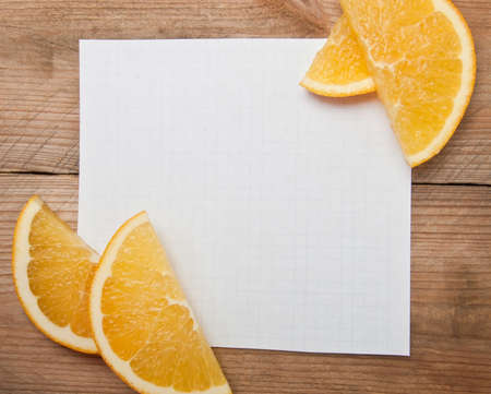 sheet of paper for notes with orange slices