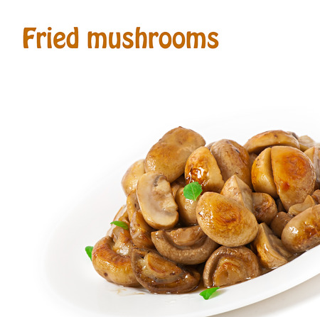 Fried mushrooms on a white plateの写真素材