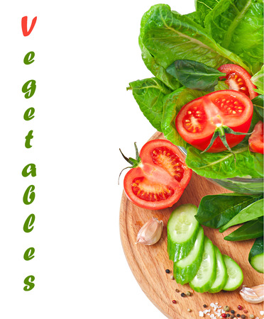 Fresh vegetables on the white background with textの写真素材