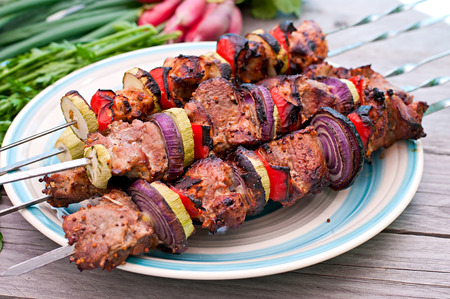 Juicy kebabs and grilled vegetablesの写真素材