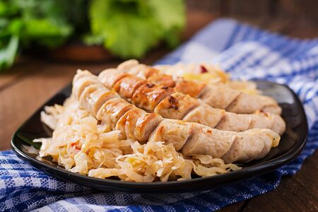 Munich sausages with fried cabbageの写真素材