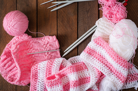 Cozy knitted background, thread and needles. Top viewの写真素材