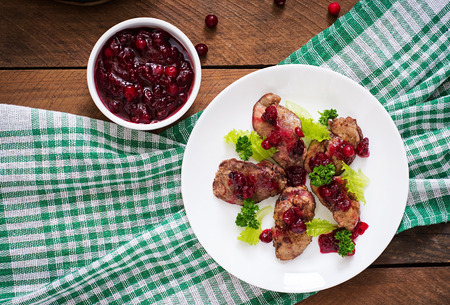 Chicken livers with cranberry sauce and lettuce. Top viewの写真素材