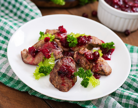 Chicken livers with cranberry sauce and lettuceの写真素材