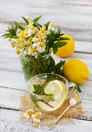 Chamomile tea with lemon and mint. Herbal tea. Dietary menu. Proper nutrition.の写真素材